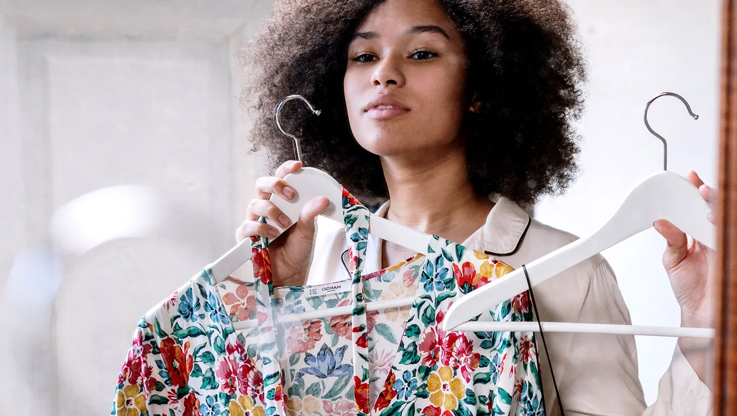 Woman Looking at Clothes Woman Looking at Clothes