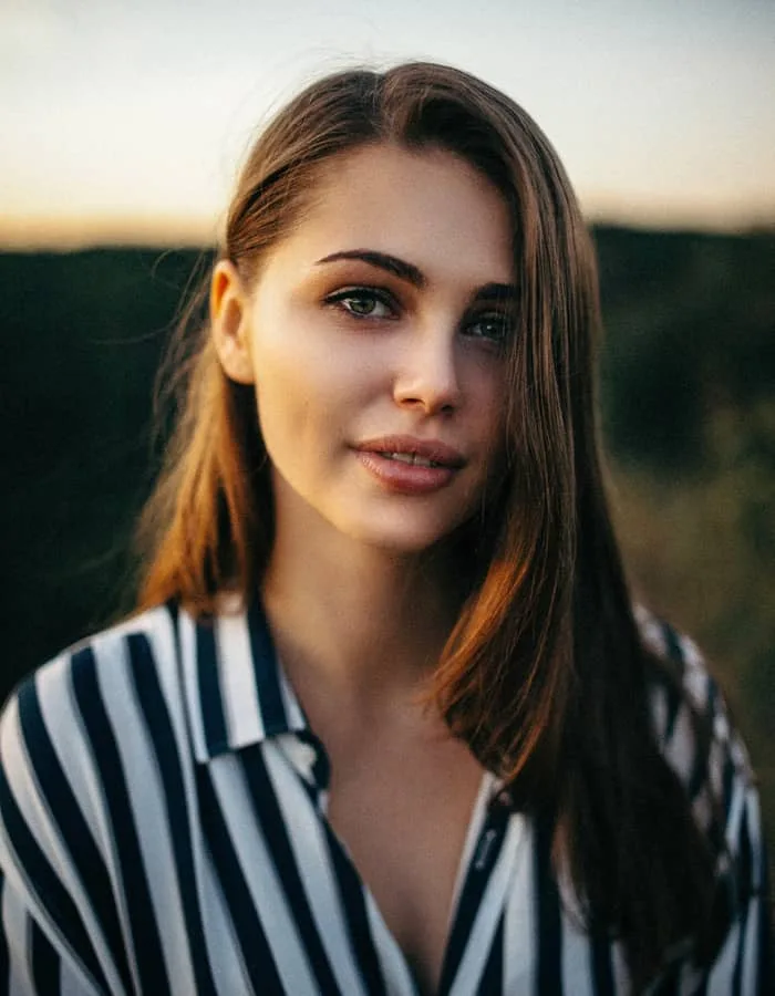 Woman Smiling Car Dealer Team Member